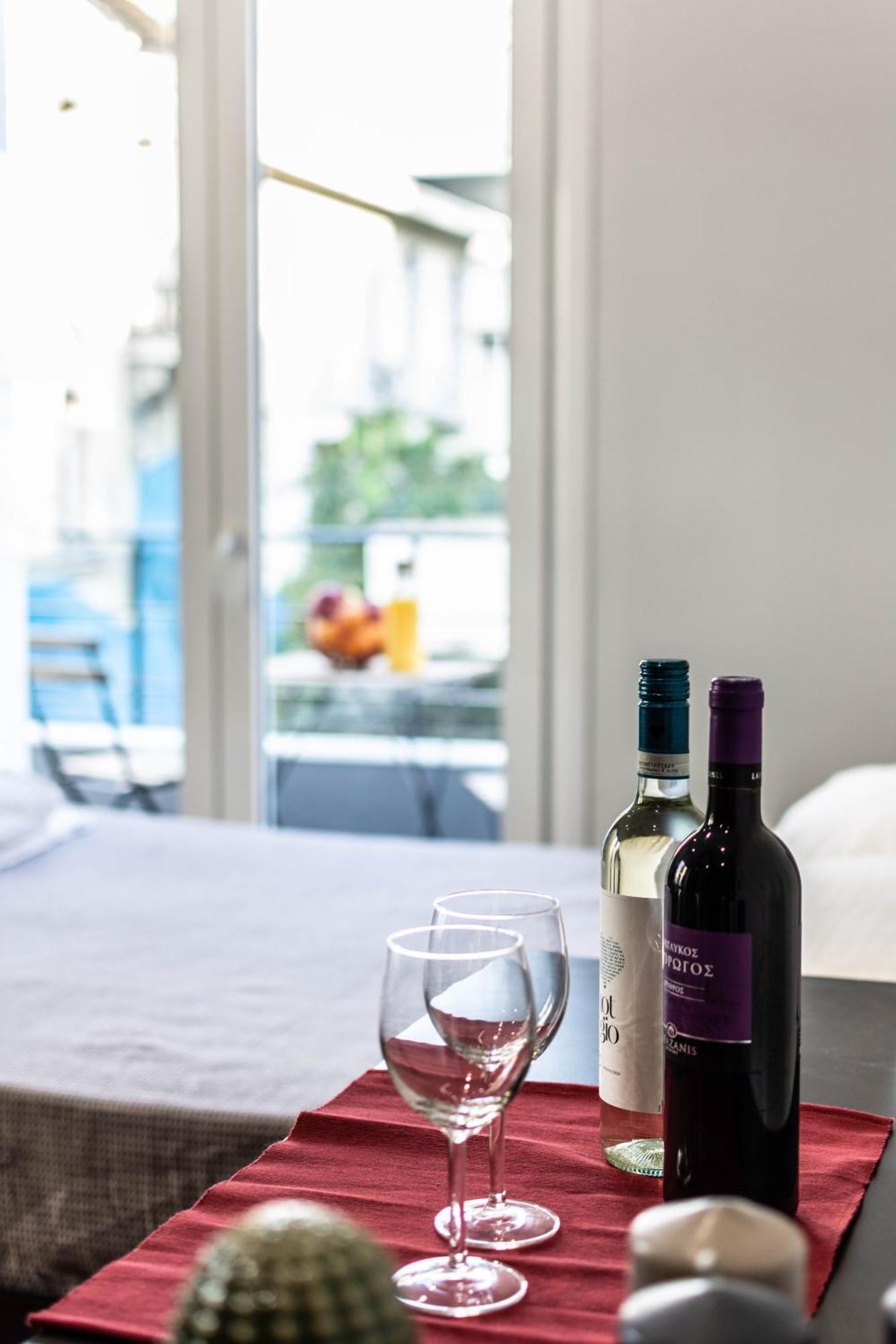 Aris Premium Accommodations Aten Exteriör bild